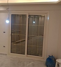 باب جرار بزجاج دبل بجورجيا ديكور